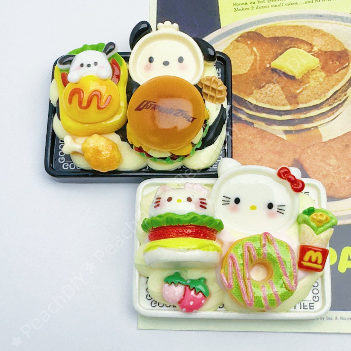 Miniature Pochacco and Hello Kitty fridge magnets