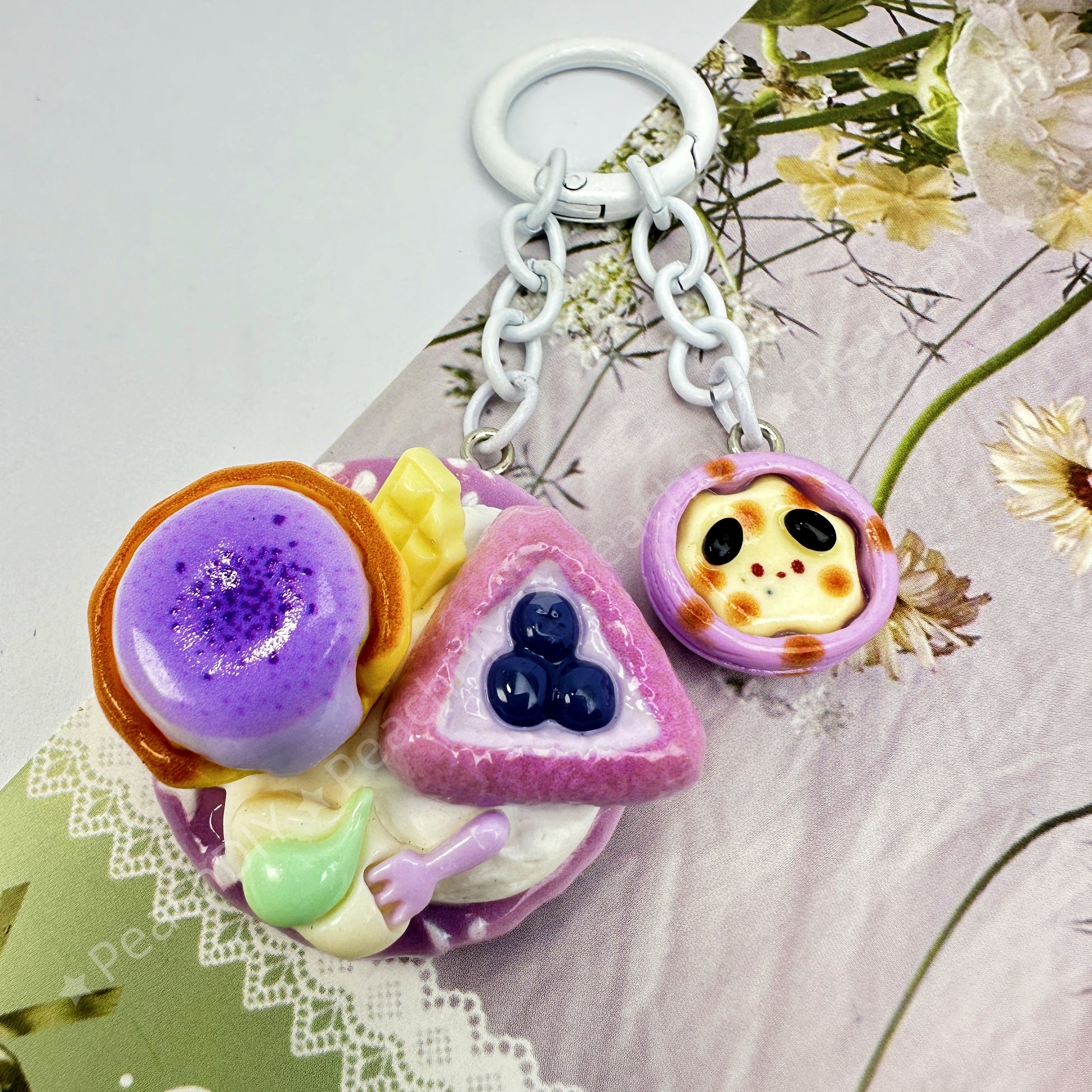 Miniature purple molten tart and grape fruit tart minifood keychain